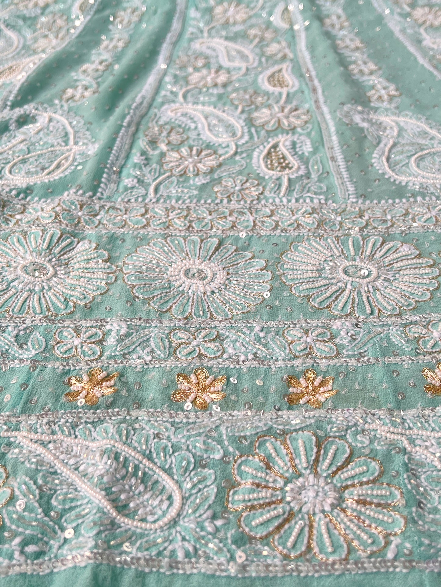 Dupatta of Mint green Anarkali featuring intricate Chikankari embroidery and embellishments