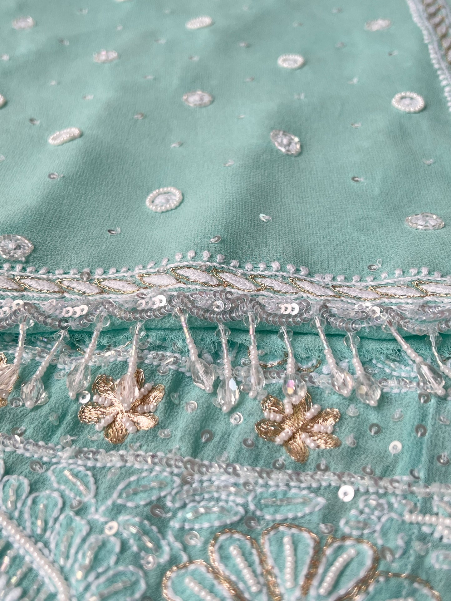 Dupatta of Mint green Anarkali featuring intricate Chikankari embroidery and embellishments
