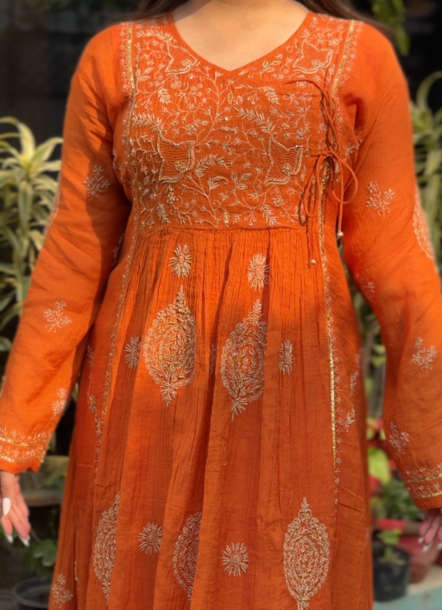 Rust Orange Tissue Angarkha with Chikankari showcasing intricate embroidery and elegant design.