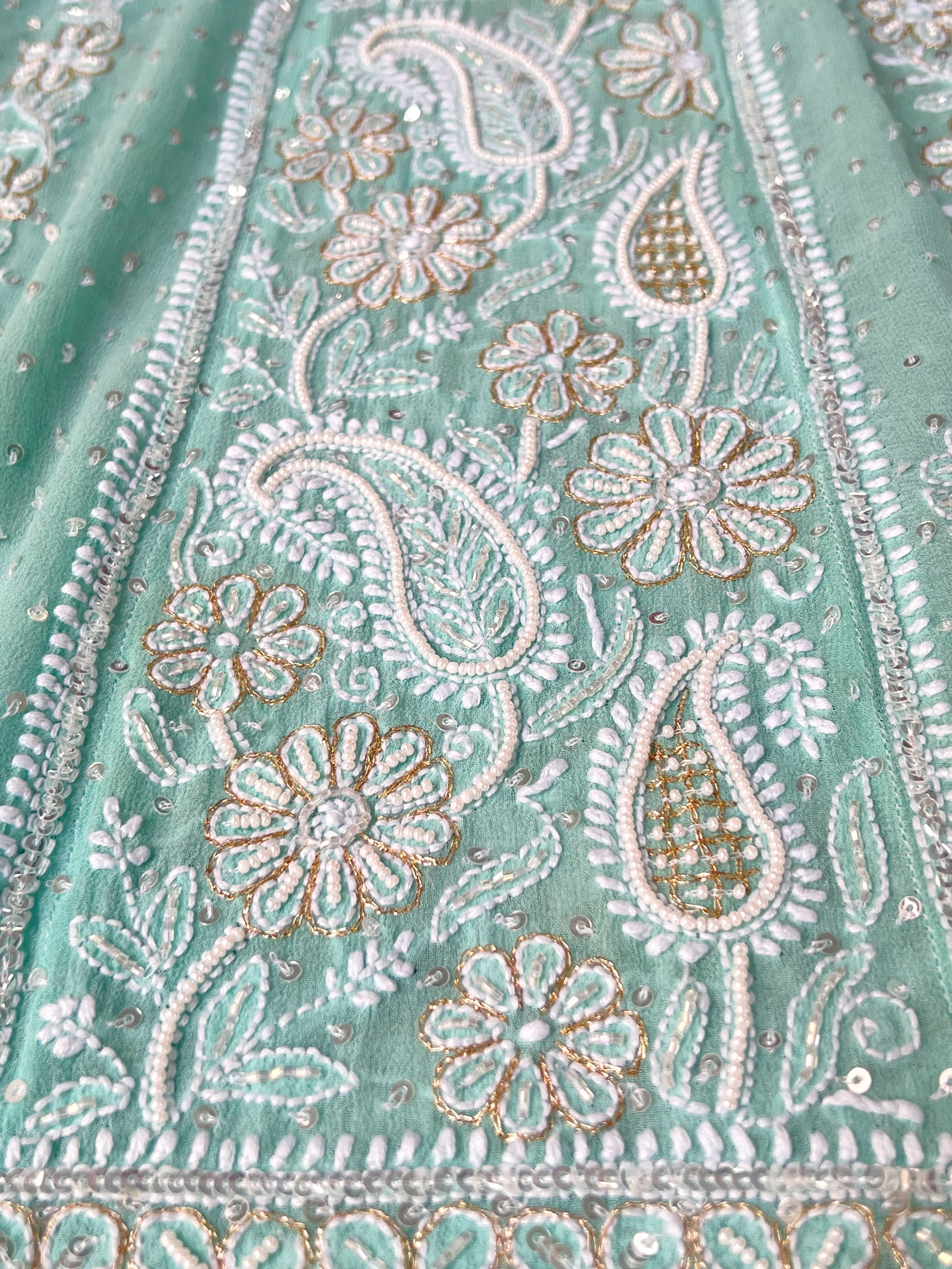 Dupatta of Mint green Anarkali featuring intricate Chikankari embroidery and embellishments