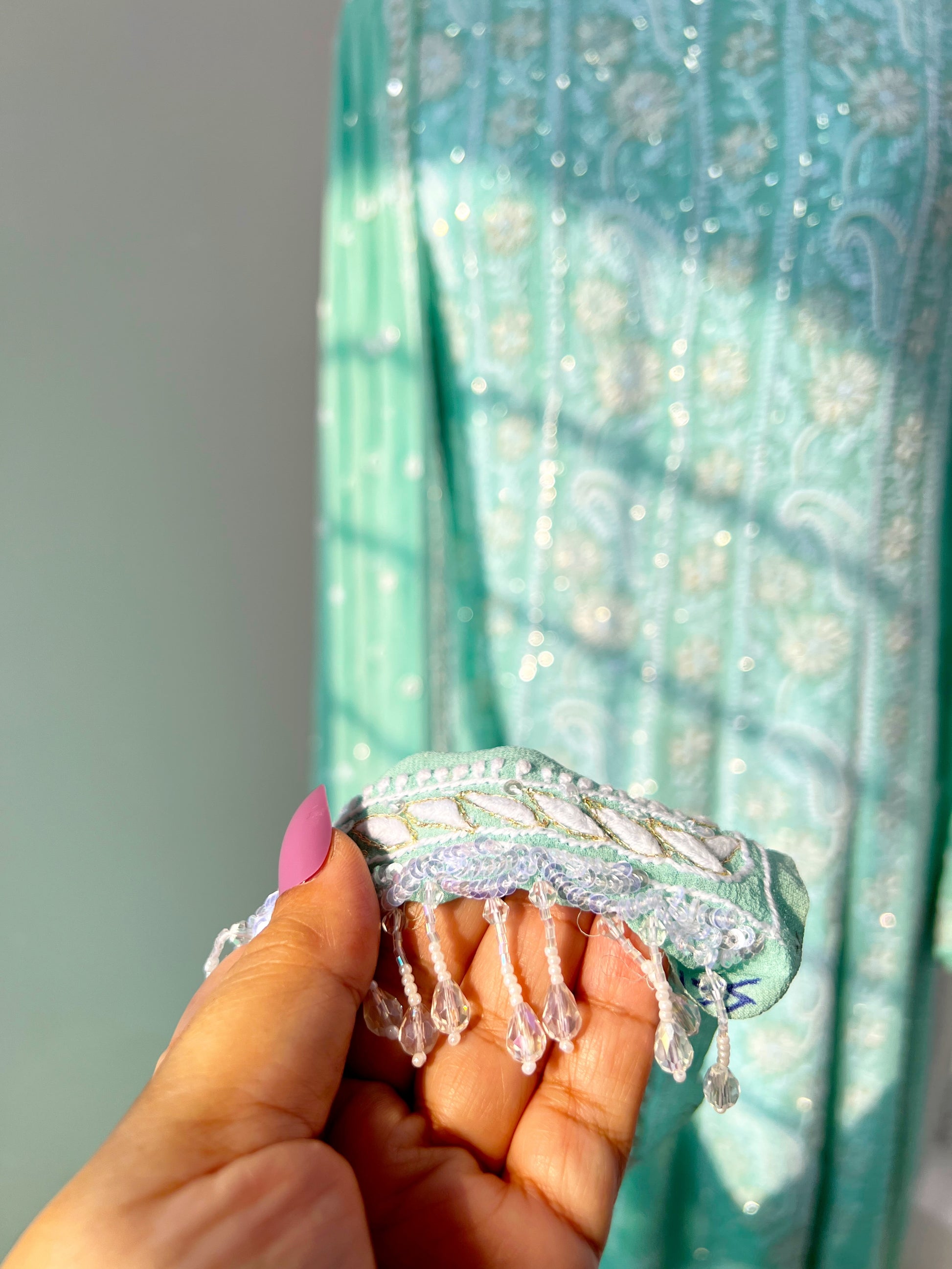 Dupatta of Mint green Anarkali featuring intricate Chikankari embroidery and embellishments
