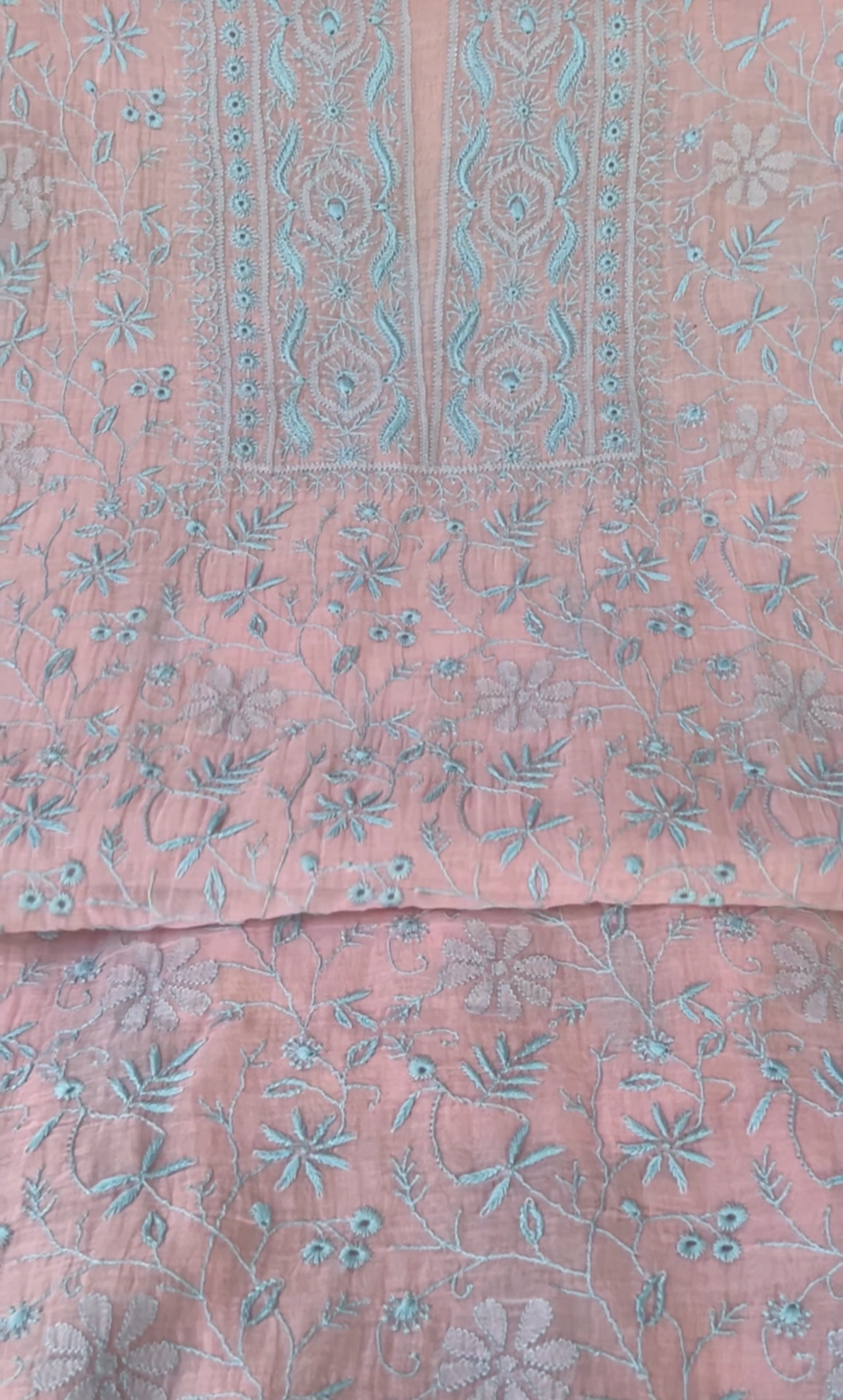 Blush pink mul chanderi suit with delicate blue thread chikankari embroidery, perfect for elegant occasions.