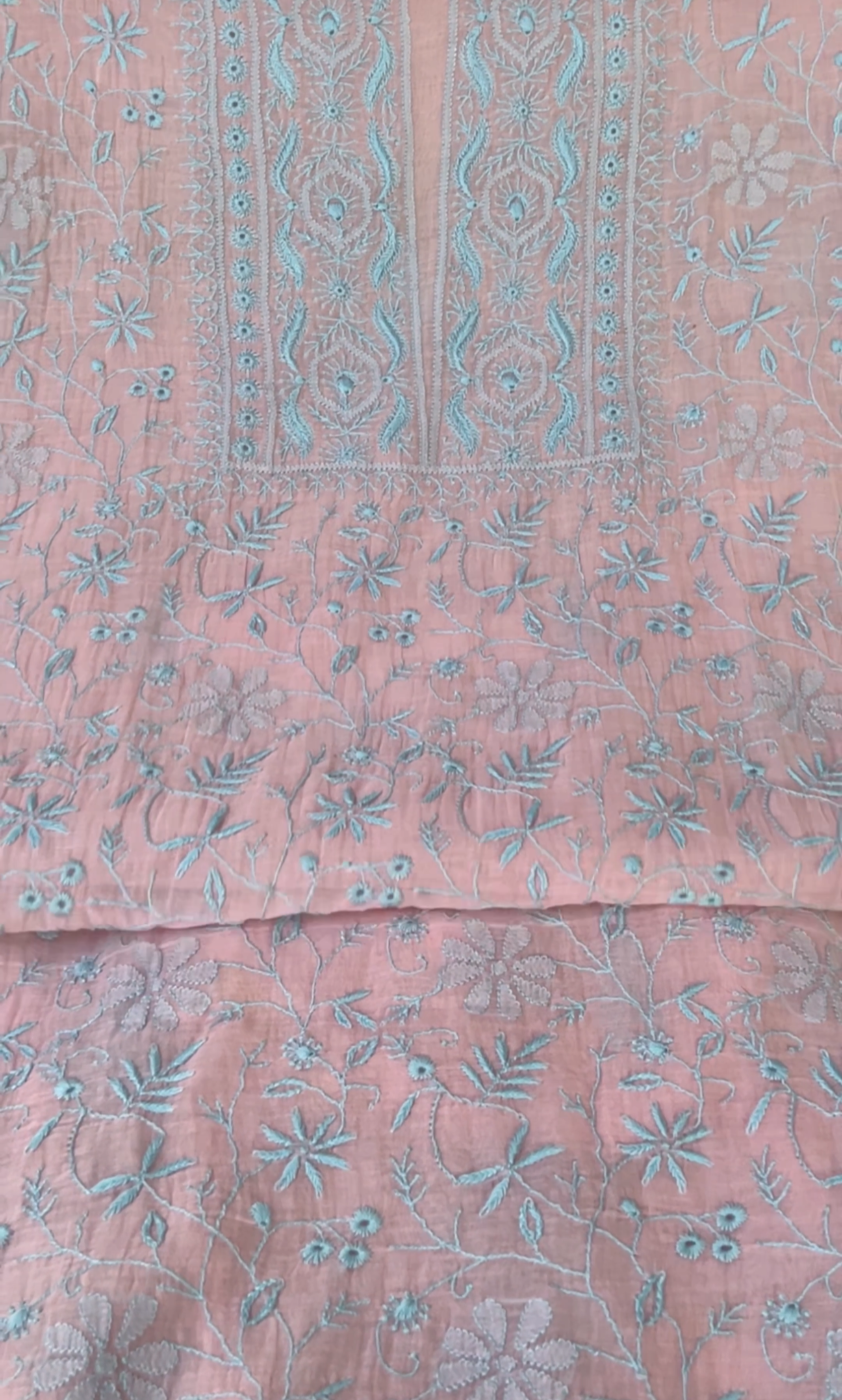 Blush pink mul chanderi suit with delicate blue thread chikankari embroidery, perfect for elegant occasions.