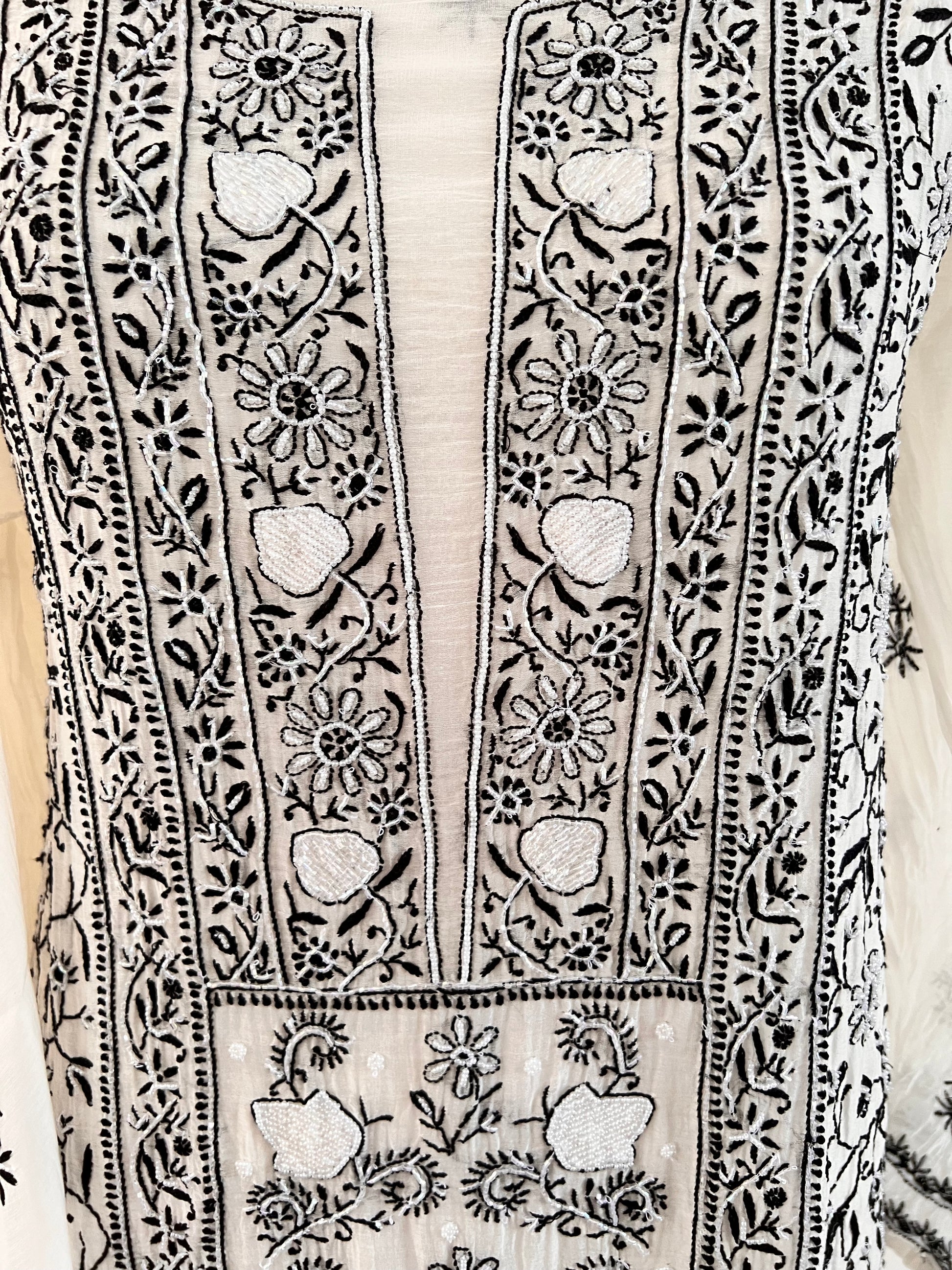 Monochrome Chikankari and Embellishments Kurta Set showcasing intricate embroidery on lightweight Mul Chanderi.