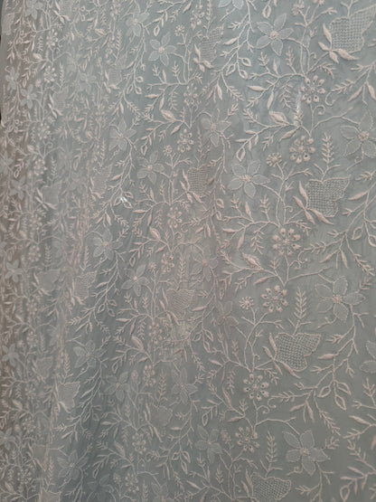 Detailed embroidery of the Powder Blue Pure Georgette Suit with Do Taar Chikankari & Haath Jaali.