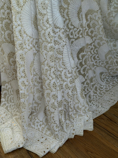 Close up of Pure Georgette Saree with Chikankari and Kamdani 
