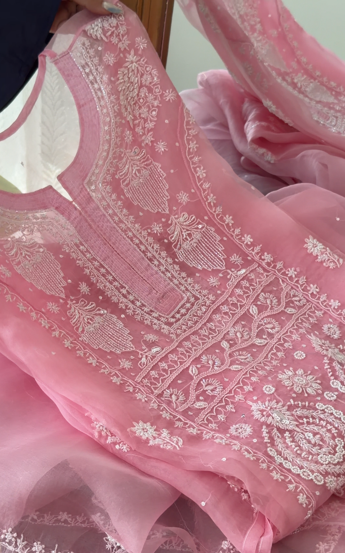 Pink Pure Organza Silk kurta set showcasing delicate Chikankari embroidery and floral motifs.