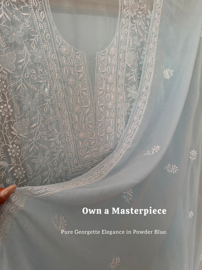 Powder blue pure georgette suit with do Taar chikankari displayed elegantly.