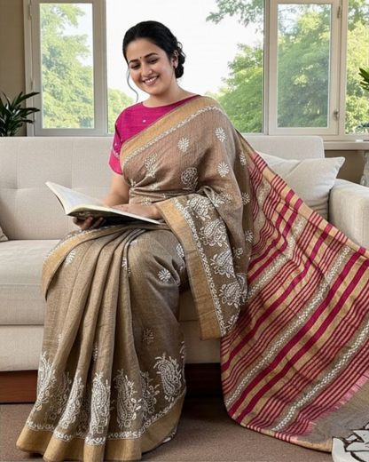 Model sitting in a room while wearing Pure Tussar Silk Saree With Chikankari