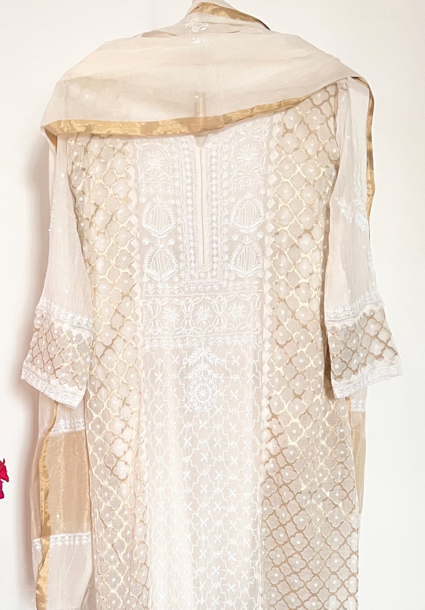 Mul Chanderi Chikankari kurta set with elegant gold Zari weave and intricate hand-embroidered details, perfect for festive occasions.