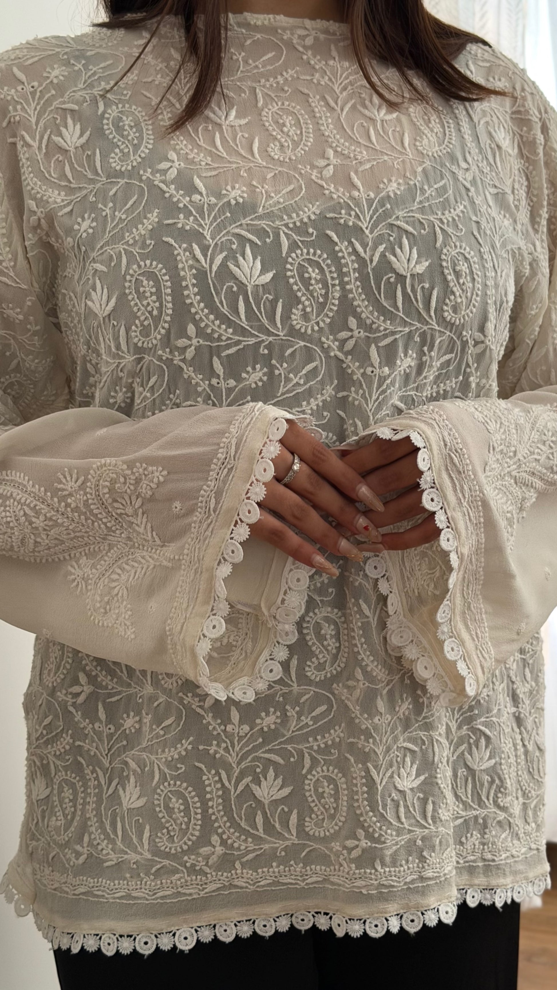 The Mehrab Shirt featuring hand-embroidered fine chikankari on pure georgette with intricate lace sleeves.